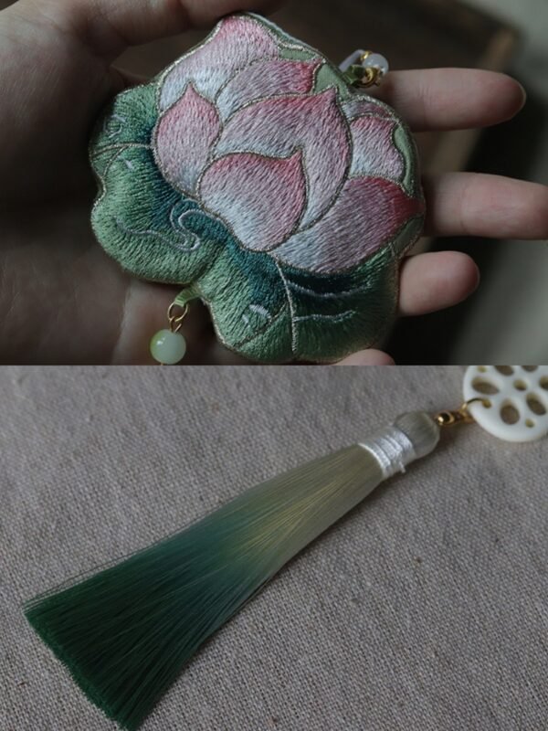 Lotus embroidery and tassel decoration on fabric