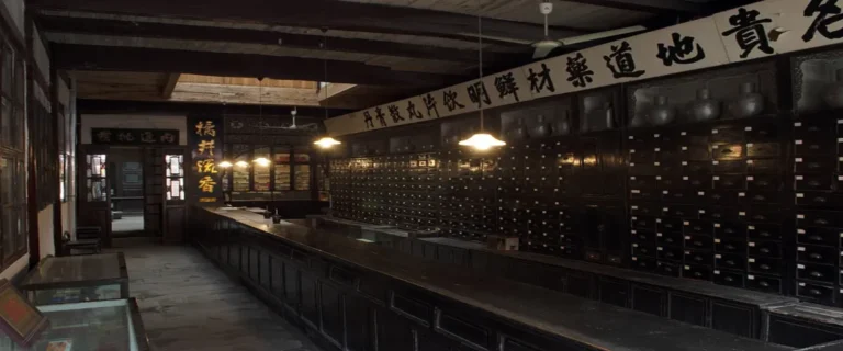 Historic Chinese apothecary interior with wooden drawers.