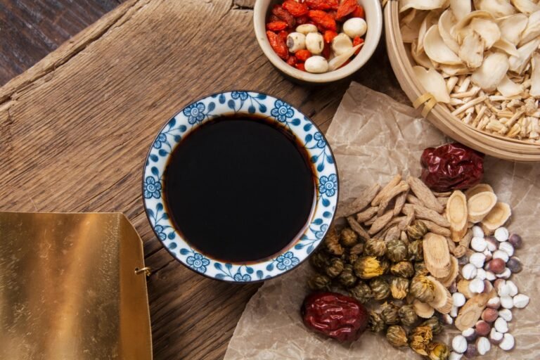 Dragonheart herbal decoction and tonic ingredients flat lay